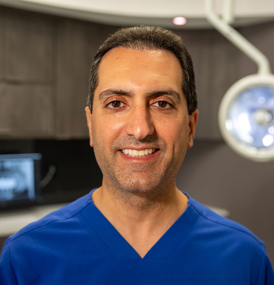 headshot of doctor smiling