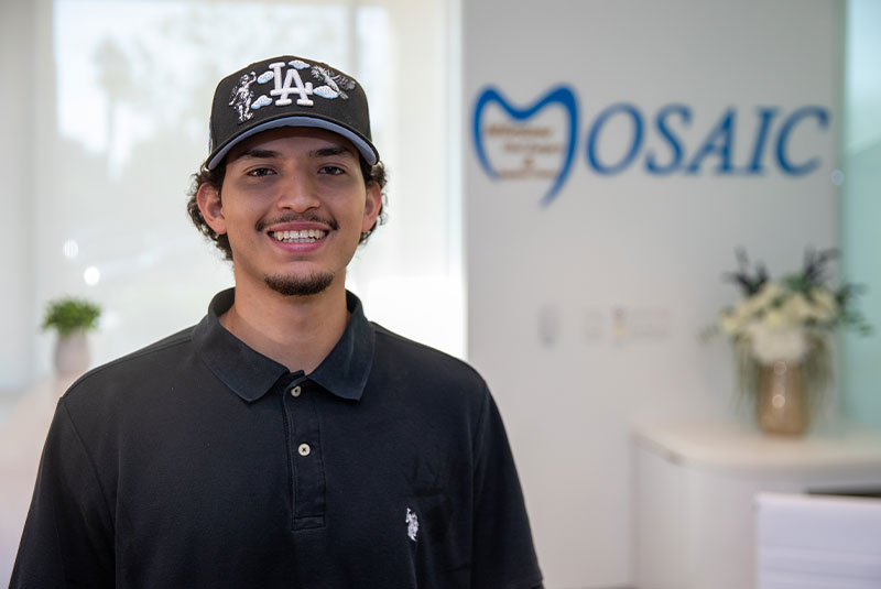 headshot of dental patient within the dental center